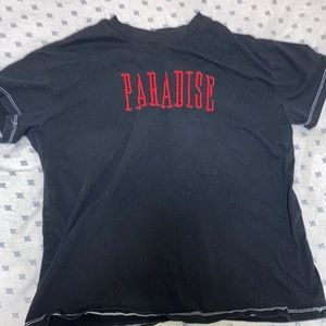 Black shirt saying paradise